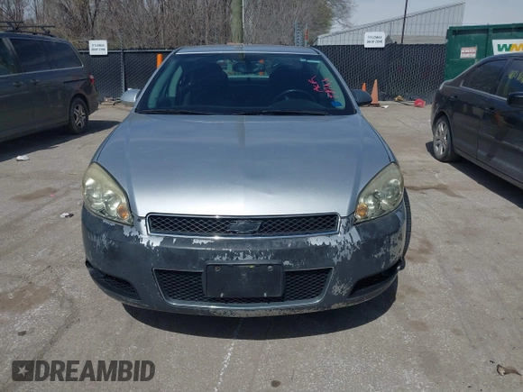 2013 Chevrolet Impala LTZ with VIN 2G1WC5E38D1235332, listed as a IAAI auction lot 41891472 with 137,567 mi miles and . Bid and sale history available at DreamBid. Image 6.