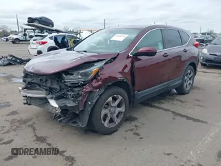 2019 Honda CR-V EX with VIN 7FARW2H56KE053022, listed as a IAAI auction lot 41848570 with 128,676 mi miles. Bid and sale history available at carsss.com. Image 18.