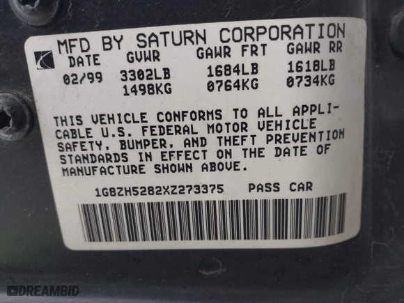 1999 Saturn SL with VIN 1G8ZH5282XZ273375, listed as a IAAI auction lot 41787290 with 230,397 mi miles. Bid and sale history available at carsss.com. Image 9.
