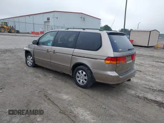 2003 Honda Odyssey EX z VIN 2HKRL18683H505577, wystawiony jako IAAI lot #42118231 z przebiegiem 234 329 mil mil oraz . Historia ofert i sprzedaży dostępna na DreamBid. Obrazek 3.