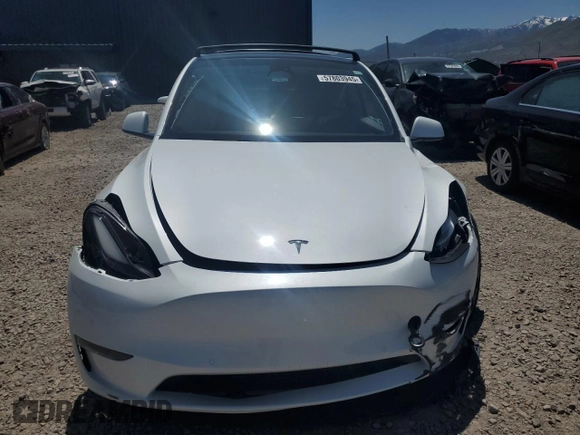 2022 Tesla Model Y Performance с VIN 7SAYGDEF4NF522984, выставлен на аукционе Copart как лот 57803945 с пробегом 37 327 миль миль и Списание • Salvage title. История ставок и продаж доступна на DreamBid. Изображение 5.