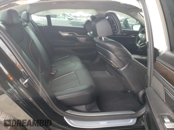 2017 BMW 7 Series 740i with VIN WBA7E2C31HG741176, listed as a Copart auction lot 65698233 with 27,332 mi miles. Bid and sale history available at carsss.com. Image 10.
