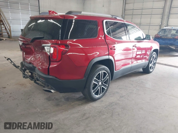 2023 GMC Acadia SLT with VIN 1GKKNULS2PZ220880, listed as a IAAI auction lot 42104702 with 33,536 mi miles and . Bid and sale history available at DreamBid. Image 4.