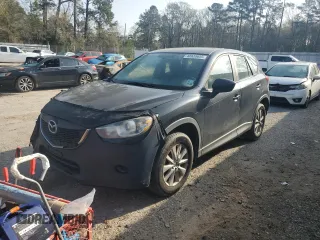2015 Mazda CX-5 Sport z VIN JM3KE2BE7F0439419, wystawiony jako Copart lot #48939655 z przebiegiem 306 653 mil mil oraz Szkoda całkowita • Salvage title. Historia ofert i sprzedaży dostępna na DreamBid. Obrazek 1.
