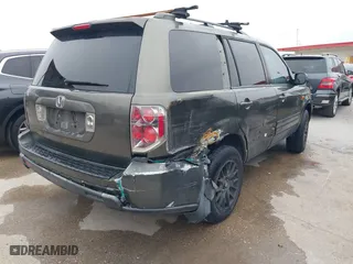 2006 Honda Pilot EX-L with VIN 5FNYF28556B010384, listed as a IAAI auction lot 41380835 with 233,359 mi miles. Bid and sale history available at carsss.com. Image 4.