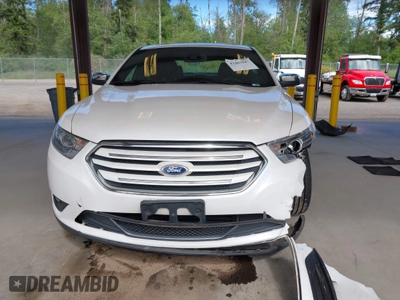 2015 Ford Taurus Limited with VIN 1FAHP2J81FG118224, listed as a IAAI auction lot 42402947 with 142,885 mi miles and . Bid and sale history available at DreamBid. Image 12.