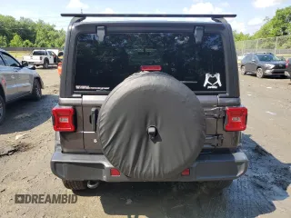 2018 Jeep Wrangler Unlimited Sahara with VIN 1C4HJXEGXJW229881, listed as a Copart auction lot 58762775 with 82,470 mi miles and Salvage title. Bid and sale history available at DreamBid. Image 6.