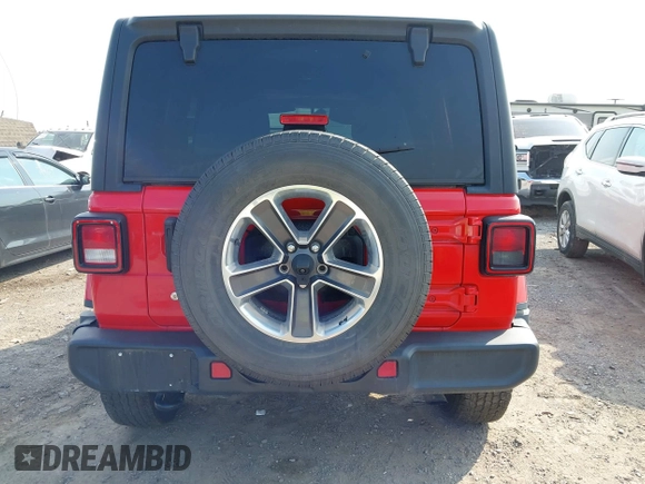2020 Jeep Wrangler Unlimited Sahara with VIN 1C4HJXEN0LW184564, listed as a IAAI auction lot 42439173 with 79,426 mi miles and . Bid and sale history available at DreamBid. Image 16.