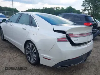 2019 Lincoln MKZ Reserve II z VIN 3LN6L5E94KR607412, wystawiony jako IAAI lot #42231994 z przebiegiem 54 812 mil mil oraz . Historia ofert i sprzedaży dostępna na DreamBid. Obrazek 3.