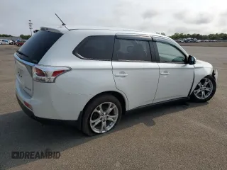 2014 Mitsubishi Outlander SE z VIN JA4AZ3A39EZ016327, wystawiony jako Copart lot #59977075 z przebiegiem 77 214 mil mil oraz Szkoda całkowita • Salvage title. Historia ofert i sprzedaży dostępna na DreamBid. Obrazek 3.