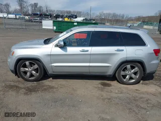 2012 Jeep Grand Cherokee Overland with VIN 1C4RJFCGXCC292257, listed as a IAAI auction lot 41844192 with 182,522 mi miles. Bid and sale history available at carsss.com. Image 14.