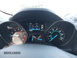 2015 Ford Escape Titanium with VIN 1FMCU9J97FUB57833, listed as a IAAI auction lot 41894505 with 176,975 mi miles. Bid and sale history available at carsss.com. Image 7.