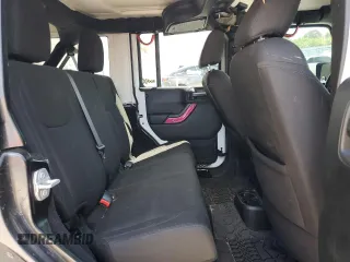 2018 Jeep Wrangler JK Unlimited Sport S with VIN 1C4BJWDG7JL814226, listed as a Copart auction lot 72442484 with 49,658 mi miles and Salvage Title. Bid and sale history available at carsss.com. Image 11.