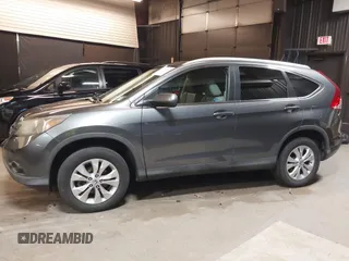 2012 Honda CR-V EX-L with VIN 2HKRM4H75CH619513, listed as a IAAI auction lot 42614822 with 116,903 mi miles and . Bid and sale history available at DreamBid. Image 14.