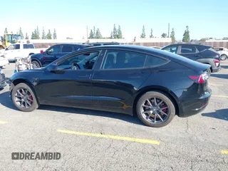 2018 Tesla Model 3 Long Range Battery with VIN 5YJ3E1EA5JF171948, listed as a IAAI auction lot 41993887 with 42,370 mi miles and . Bid and sale history available at DreamBid. Image 13.