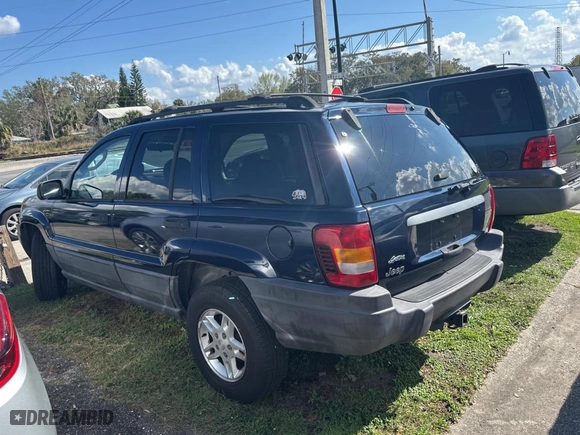 2004 Jeep Grand Cherokee Laredo with VIN 1J4GX48N24C436753, listed as a Copart auction lot 45039845 with 114,024 mi miles and Clean Title. Bid and sale history available at carsss.com. Image 3.