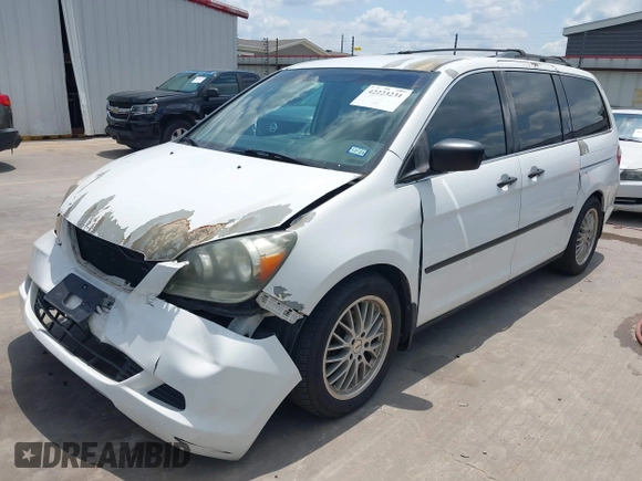 2007 Honda Odyssey LX with VIN 5FNRL382X7B135892, listed as a IAAI auction lot 42223231 with 204,054 mi miles and . Bid and sale history available at DreamBid. Image 20.