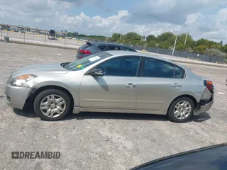 2009 Nissan Altima SL with VIN 1N4AL21E59N486182, listed as a IAAI auction lot 41920572 with 73,443 mi miles and . Bid and sale history available at DreamBid. Image 14.