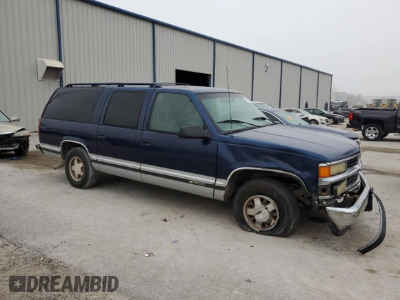 1996 Chevrolet Suburban with VIN 1GNEC16R8TJ359059, listed as a Copart auction lot 86344584 with 390,115 mi miles and Salvage Title. Bid and sale history available at carsss.com. Image 4.