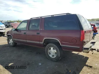 1998 GMC Suburban z VIN 3GKFK16R1WG503206, wystawiony jako Copart lot #69802344 z przebiegiem 231 148 mil mil oraz Szkody całkowita. Historia ofert i sprzedaży dostępna na DreamBid. Obrazek 2.