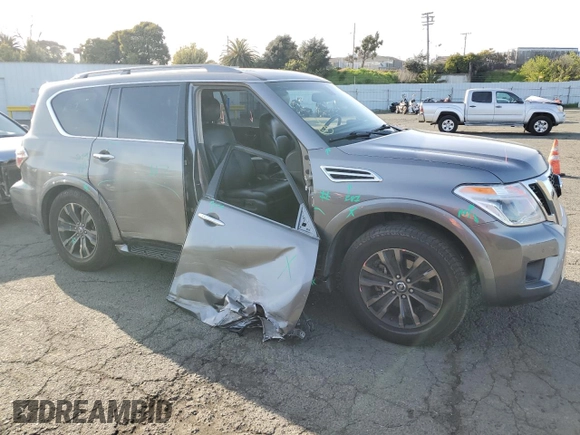 2017 Nissan Armada Platinum z VIN JN8AY2NF1H9300454, wystawiony jako Copart lot #49198605 z przebiegiem 109 546 mil mil oraz Szkoda całkowita • Salvage title. Historia ofert i sprzedaży dostępna na DreamBid. Obrazek 4.