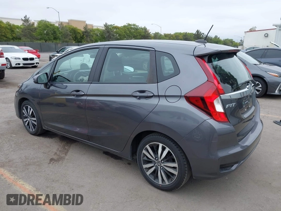 2018 Honda Fit EX with VIN 3HGGK5H85JM704873, listed as a IAAI auction lot 42421049 with 58,481 mi miles and . Bid and sale history available at DreamBid. Image 3.