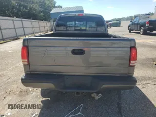 2003 Dodge Dakota Sport with VIN 1D7HL38N43S184708, listed as a Copart auction lot 73320964 with 143,398 mi miles and Salvage Title. Bid and sale history available at carsss.com. Image 6.