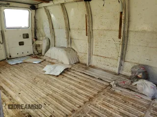 1992 GMC Vandura z VIN 2GTGG39KXN4515226, wystawiony jako Copart lot #85211254 z przebiegiem 594 809 mil mil oraz Szkody całkowita. Historia ofert i sprzedaży dostępna na DreamBid. Obrazek 11.