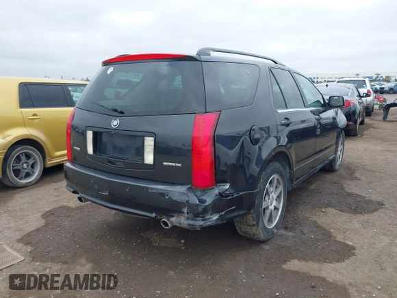 2004 Cadillac SRX with VIN 1GYDE63A540153774, listed as a IAAI auction lot 41500070 with 144,718 mi miles. Bid and sale history available at carsss.com. Image 4.