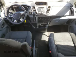 2015 Ford Transit XL with VIN 1FMZK1YMXFKB16362, listed as a Copart auction lot 57024515 with 112,665 mi miles and Salvage title. Bid and sale history available at DreamBid. Image 8.