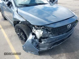 2023 Mazda CX-50 S Preferred Plus with VIN 7MMVABCM3PN122068, listed as a IAAI auction lot 41921767 with 32,293 mi miles and . Bid and sale history available at DreamBid. Image 6.