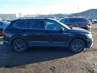 2023 Volkswagen Tiguan SE with VIN 3VVMB7AX8PM032557, listed as a IAAI auction lot 41585975 with 28,706 mi miles and . Bid and sale history available at DreamBid. Image 13.