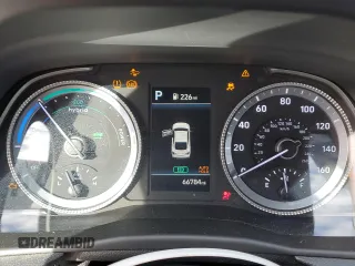 2022 Hyundai Sonata Hybrid Blue with VIN KMHL24JJ5NA051528, listed as a Copart auction lot 82478744 with 66,784 mi miles and Salvage Title. Bid and sale history available at carsss.com. Image 9.