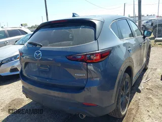 2023 Mazda CX-5 2.5 S Preferred Package with VIN JM3KFBCM6P0266870, listed as a IAAI auction lot 41635476 with 7,511 mi miles. Bid and sale history available at carsss.com. Image 4.