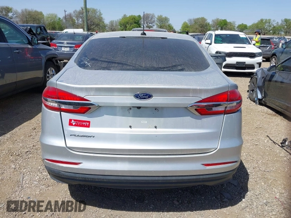 2019 Ford Fusion S with VIN 3FA6P0G71KR275393, listed as a IAAI auction lot 41827288 with 108,160 mi miles and . Bid and sale history available at DreamBid. Image 16.