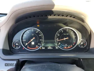 2015 BMW 7 Series 750i with VIN WBAYA8C53FGK19778, listed as a Copart auction lot 77258684 with 34,535 mi miles and Salvage title. Bid and sale history available at DreamBid. Image 9.