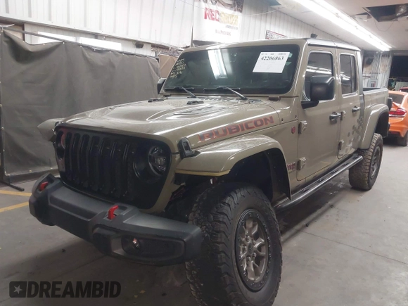 2020 Jeep Gladiator Rubicon z VIN 1C6JJTBGXLL178893, wystawiony jako IAAI lot #42206863 z przebiegiem 29 138 mil mil oraz . Historia ofert i sprzedaży dostępna na DreamBid. Obrazek 2.