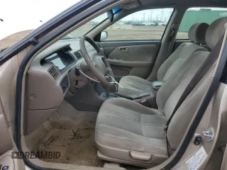 2000 Toyota Camry CE z VIN 4T1BG22K6YU991932, wystawiony jako Copart lot #55588155 z przebiegiem 188 363 mil mil oraz Szkoda całkowita • Salvage title. Historia ofert i sprzedaży dostępna na DreamBid. Obrazek 7.