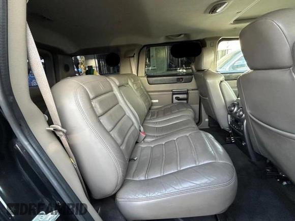 2003 Hummer H2 with VIN 5GRGN23U23H145183, listed as a Copart auction lot 84566884 with 85,945 mi miles and Clean Title. Bid and sale history available at carsss.com. Image 6.