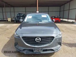 2016 Mazda CX-9 Sport with VIN JM3TCABY5G0122478, listed as a IAAI auction lot 42115795 with 134,980 mi miles and . Bid and sale history available at DreamBid. Image 12.