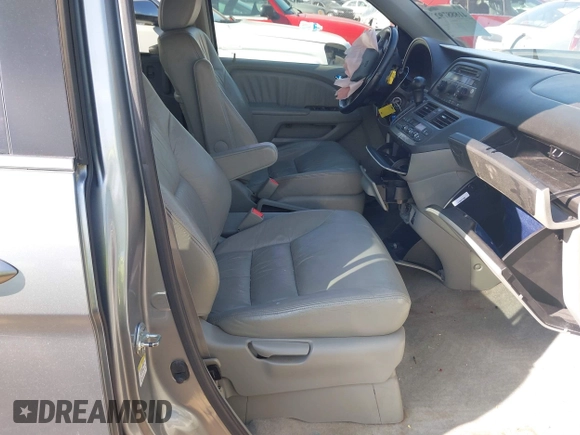 2007 Honda Odyssey EX-L with VIN 5FNRL38677B054173, listed as a IAAI auction lot 41888792 with 142,438 mi miles and . Bid and sale history available at DreamBid. Image 5.