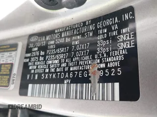 2014 Kia Sorento LX with VIN 5XYKTDA67EG489525, listed as a IAAI auction lot 42121940 with 180,281 mi miles. Bid and sale history available at carsss.com. Image 9.