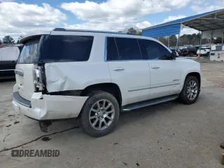 2016 GMC Yukon Denali with VIN 1GKS1CKJ4GR180185, listed as a Copart auction lot 47815835 with 197,506 mi miles and Salvage Title. Bid and sale history available at DreamBid. Image 3.