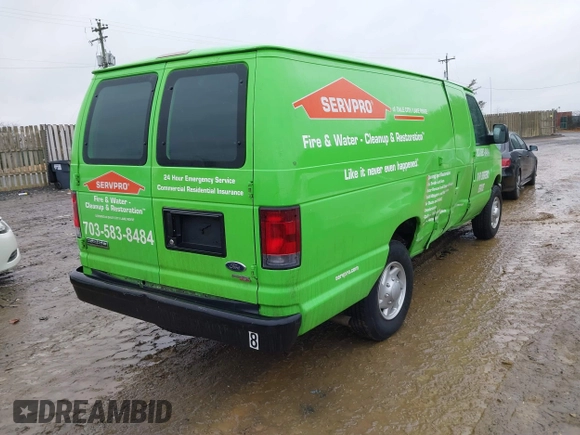 2012 Ford Econoline Cargo Commercial with VIN 1FTNS2EWXCDA43833, listed as a IAAI auction lot 41335268 with 181,390 mi miles. Bid and sale history available at carsss.com. Image 4.