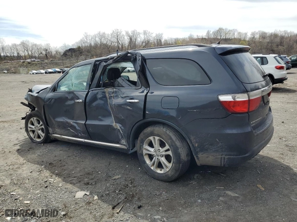 2013 Dodge Durango Crew with VIN 1C4RDJDG5DC686694, listed as a Copart auction lot 52766305 with 152,271 mi miles and Salvage Title. Bid and sale history available at carsss.com. Image 2.