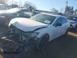 2015 Mazda 6 i Grand Touring with VIN JM1GJ1W54F1202766, listed as a IAAI auction lot 41860197 with Not Provided miles and . Bid and sale history available at DreamBid. Image 2.