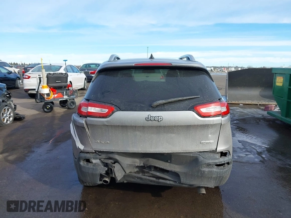 2014 Jeep Cherokee Latitude with VIN 1C4PJMCS9EW122196, listed as a IAAI auction lot 41649757 with 205,363 mi miles and . Bid and sale history available at DreamBid. Image 16.