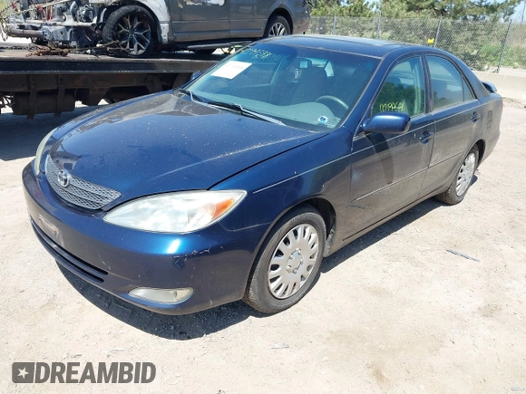 2003 Toyota Camry LE with VIN 4T1BE32K13U204938, listed as a IAAI auction lot 42194548 with 263,710 mi miles and . Bid and sale history available at DreamBid. Image 2.