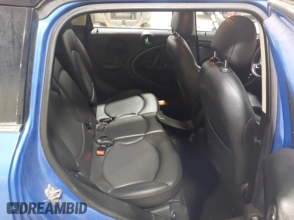 2013 MINI Countryman S ALL4 z VIN WMWZC5C59DWM16261, wystawiony jako IAAI lot #41563270 z przebiegiem 159 516 mil mil oraz . Historia ofert i sprzedaży dostępna na DreamBid. Obrazek 8.