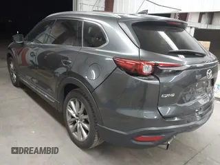 2017 Mazda CX-9 Grand Touring z VIN JM3TCADY2H0134070, wystawiony jako IAAI lot #41611243 z przebiegiem 87 046 mil mil oraz . Historia ofert i sprzedaży dostępna na DreamBid. Obrazek 3.